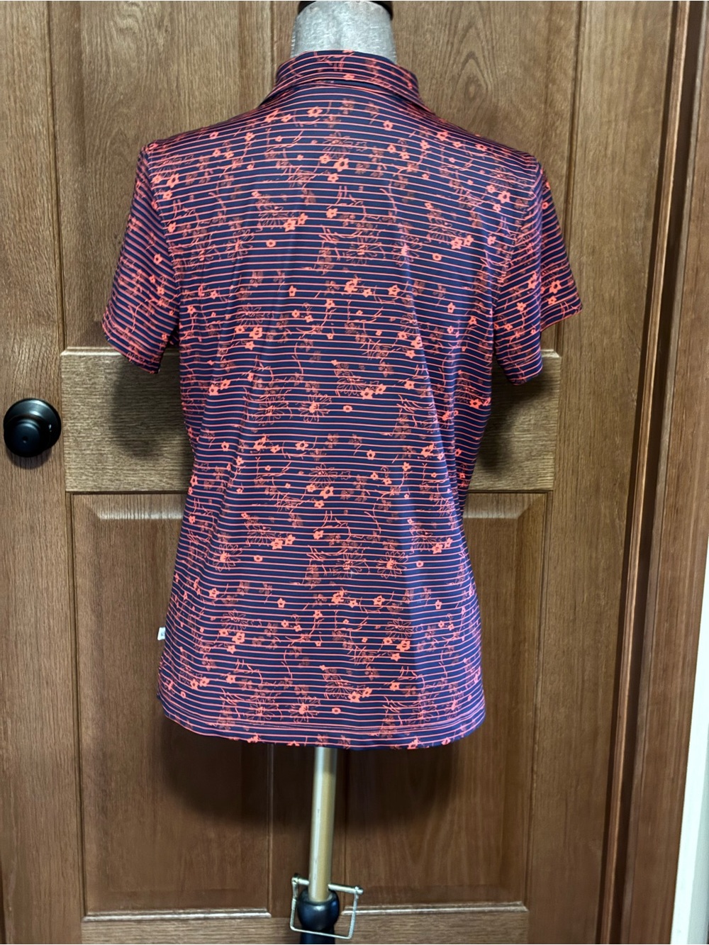 Lady Hagen Navy Polo with Coral Floral Stripe Pattern - Picture 2 of 4